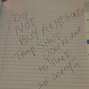 Handwritten Note on Lined Paper